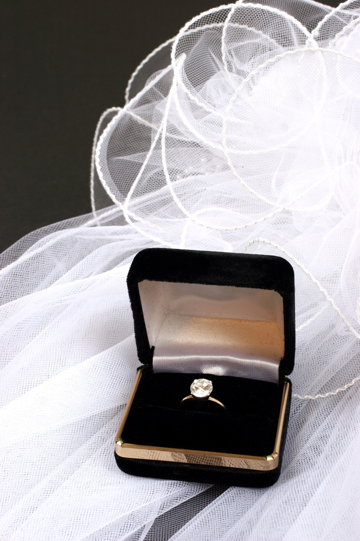Engagement ring and bridal veil