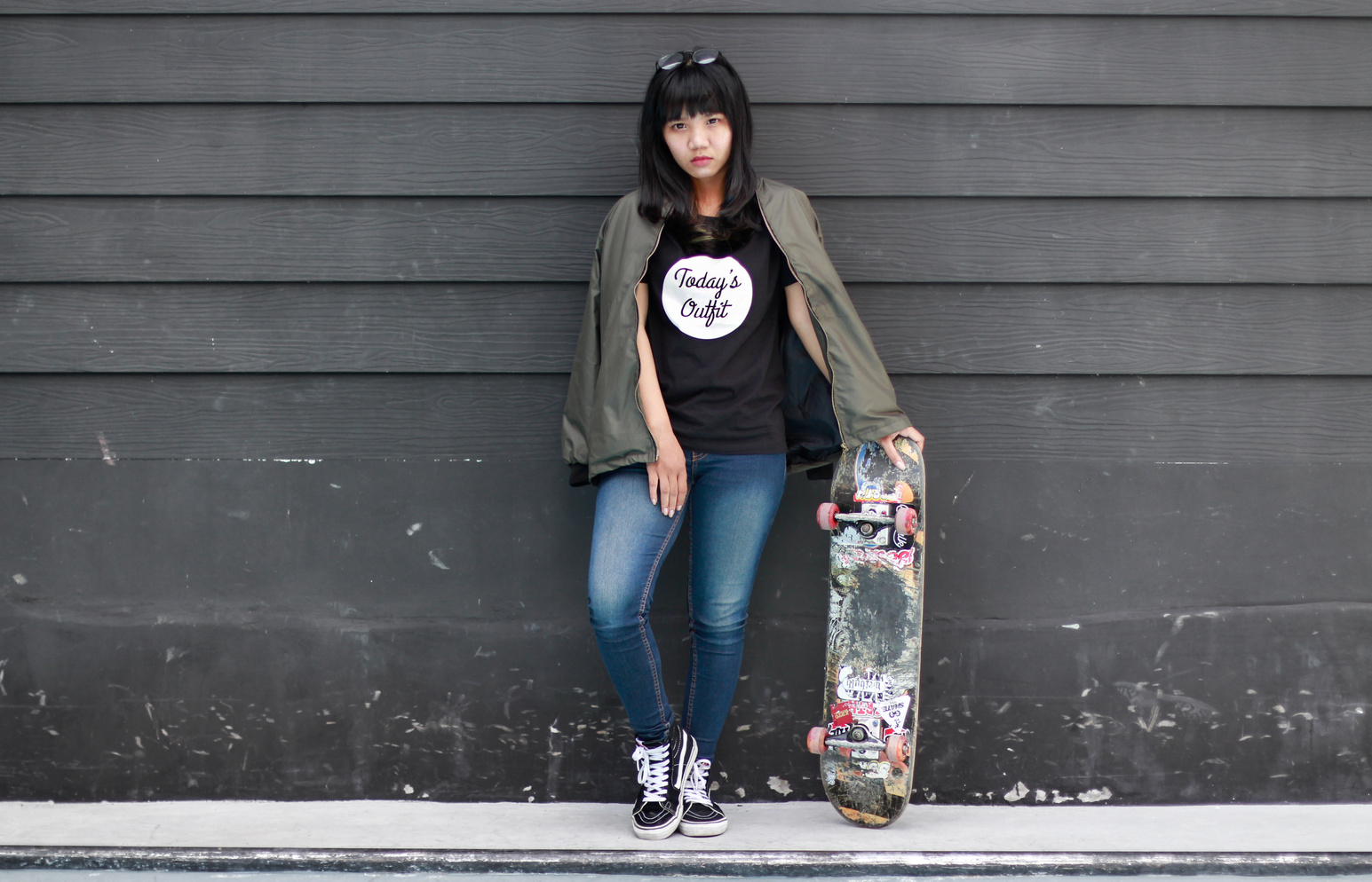 Woman in Black Crew-neck Shirt and Blue Jeans